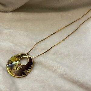 Necklace hand painted on shell, back is mother of pearl, gold tone chain .